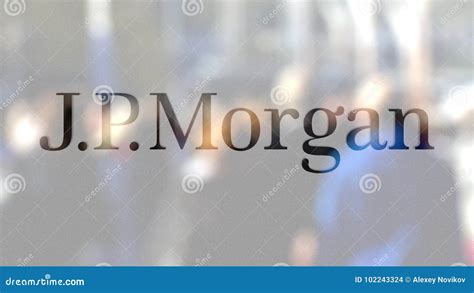 J.P. Morgan Logo on a Glass Against Blurred Crowd on the Steet ...