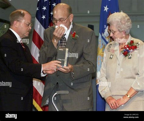 F Whitten Peters Left Secretary Of The Air Force Presents The Medal