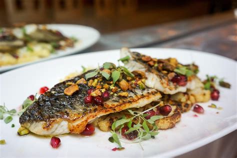 Plancha Grilled Barramundi With Charred Cauliflower Pomegranate