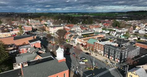 Dramatic Light And Sky In Small Town America Aerial Establishing Shot