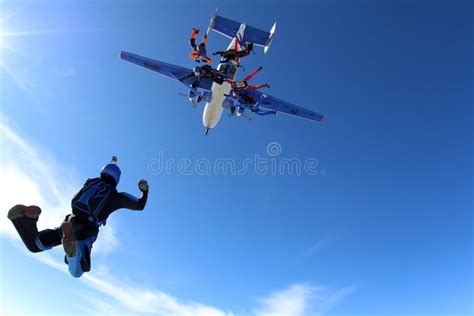 Skydivers Are Training And Jumping Out Of A Plane Stock Photo Image