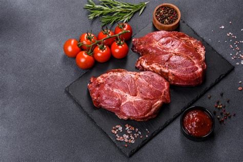 Premium Photo Perfect Raw Rib Eye Beef Steak On Black Wooden