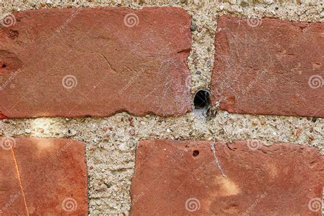 Building Hole And Closeup Of Red Brick Wall For Texture Background