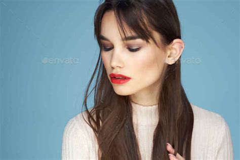 Attractive Brunette Red Lips Glamor Side Glance Blue Background Stock