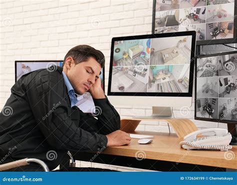 Male Security Guard Sleeping Near Monitors Stock Image Image Of