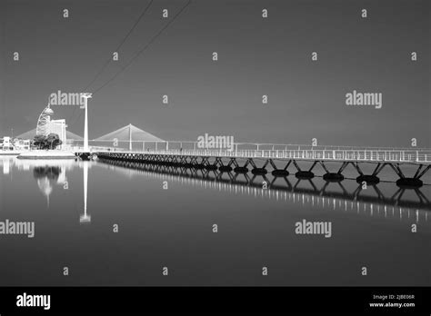 A View Of The Waterfront And The Vasco Da Gama Bridge In Lisbon