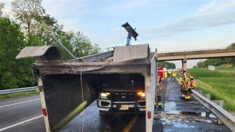 Raised Dump Bed Hits Bridge Lands On Top Of Sheriffs Deputy Vehicle