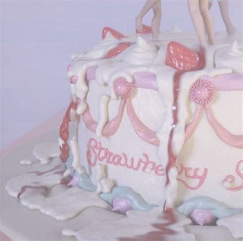 There Is A Cake That Has Two Girls On It