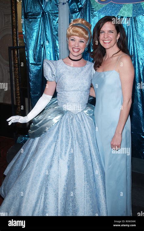 Jennifer Hale -the voice of Cinderella - posing with Cinderella at the premiere of Cinderella II ...