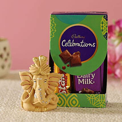 Buy Send Beige Pagdi Ganesha Idol Cadbury Combo Online Fnp