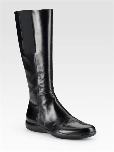 Prada Tall Flat Boots In Black Lyst