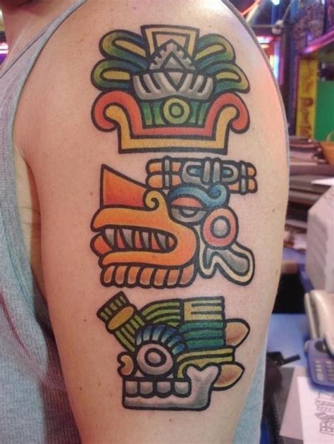 Wonderful aztec symbols tattoo in color on shoulder - Tattooimages.biz