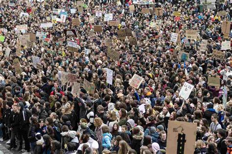 The SNB & Holcim Targeted By Climate Protestors - The Swiss Times