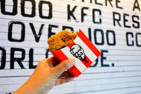 Crispy Fried Chicken And Cup Of Drink Served In Retail Background Of Kfc