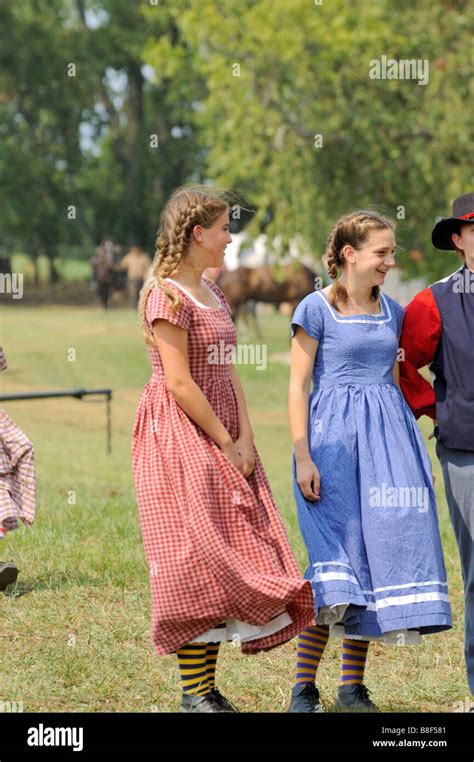 Two Young Girls In Period Dress At The Reenactment Of The 1862 American Civil War Battle Of