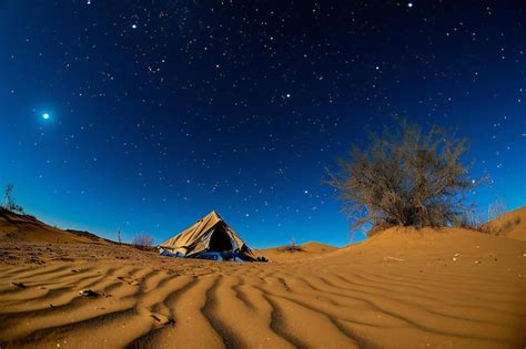 Premium Photo | Night in the desert tent in the desert with starry sky