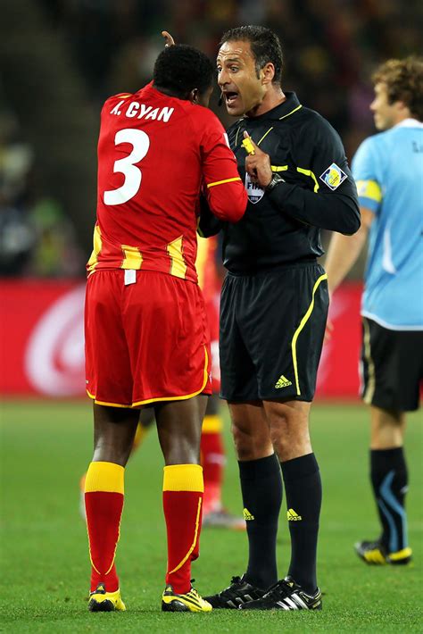 Asamoah Gyan And Olegario Benquerenca Photos Photos Uruguay V Ghana