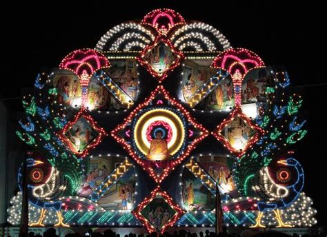 A View Of A Giant Vesak Day Display Featuring A Seated Buddha During