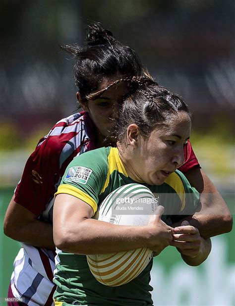 Thais Xuxu Of Brazil Fight For The Ball With A Player Of Venezuela