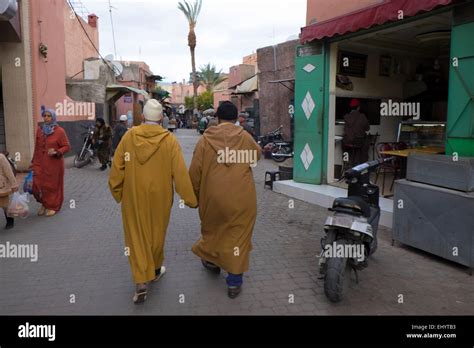 Arab men holding hands hi-res stock photography and images - Alamy