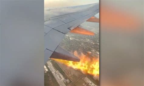 Videos Show Flames From Engine Of Plane That Returned To Houston