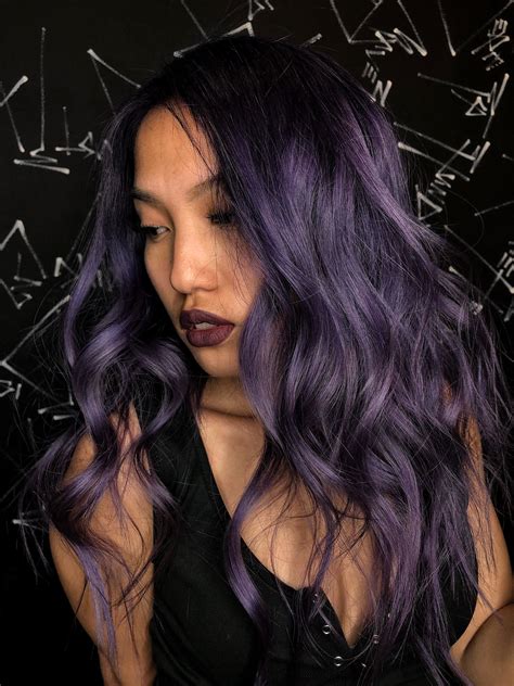 Stylists are debating the red with purple hair color trend 24