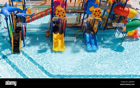 Children Playground with Colorful Yellow And Blue Plastic Slider in ...