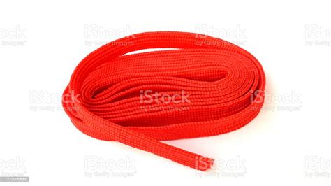 Fabric Rope In Red Color Folded In A Coil Red Rope On White Background