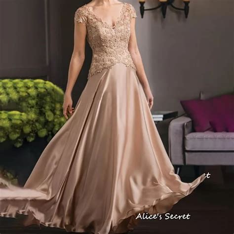 A Line Mother Of The Bride Dress Cap Sleeves V Neck Appliques Illusion Back Pleat Floor