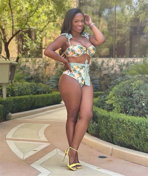 RHOA S Kandi Burruss 45 Stuns In A Lemon Bikini Amid Rumors Of A Cast