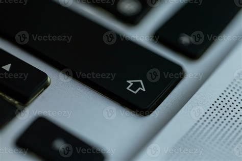 Shift button on the laptop keyboard, close-up 34466211 Stock Photo at Vecteezy