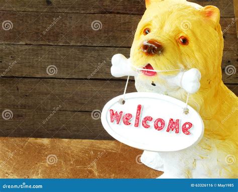 Ceramic Welcome Dog On Wooden Background Stock Photo Image Of Sign