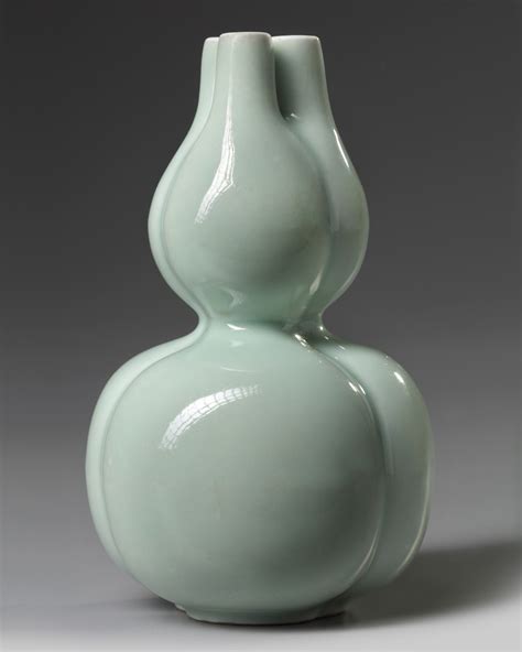 A Chinese Celadon Glazed Triple Gourd Vase