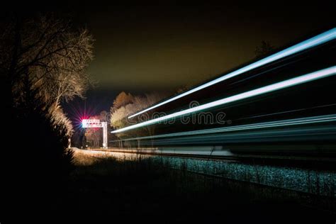 Long Exposure Of A Norfolk Southern Train Moving At Night Editorial