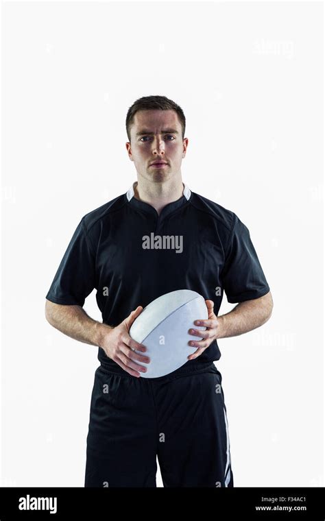 Rugby Player Holding A Rugby Ball Stock Photo Alamy