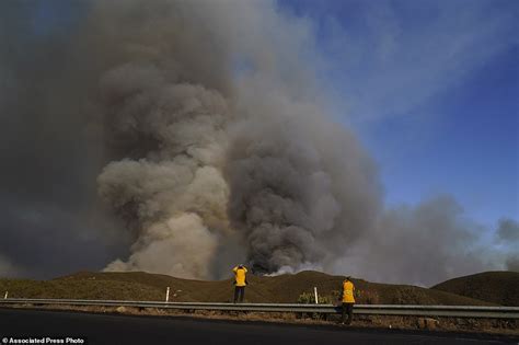 Huge wildfire rips across 5,000 acres in California as residents are ...