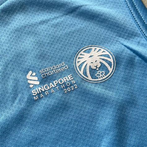 Standard Chartered Marathon 2022 Puma Singlet Top Men S Fashion