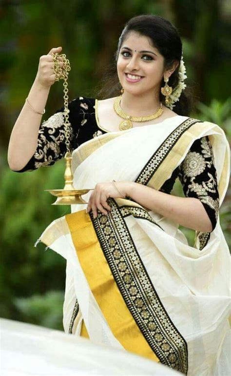 Onam Celebration Celebs Look Gorgeous In Kasavu Saree Photosimages