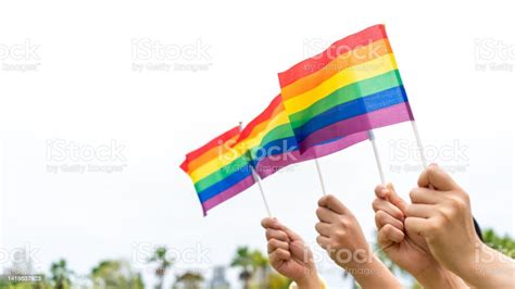 Lgbtq Rainbow Flags Being Waved Symbol Of Diversity Gay And Lesbian For