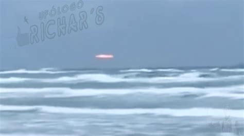 A Red Light In The Middle Of An Ocean