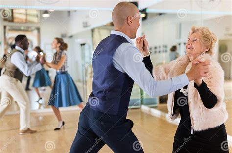 Mature Woman Dancing Swing with Young Man Stock Photo - Image of elegant, pensioner: 279371630