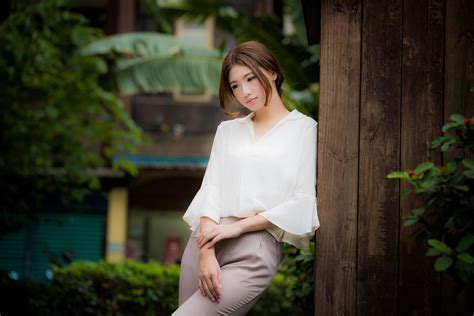 Elegant Brunette Model 8K Ultra HD Wallpaper