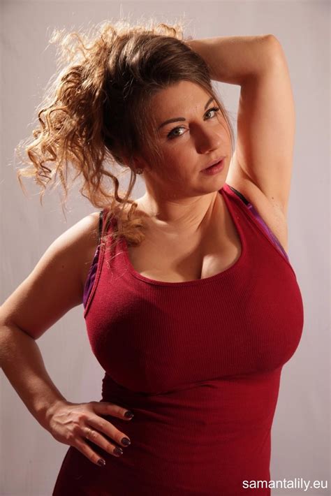 Busty Babe Samanta Lily Shows Off Her Amazing Boobs In A Tight Red Top