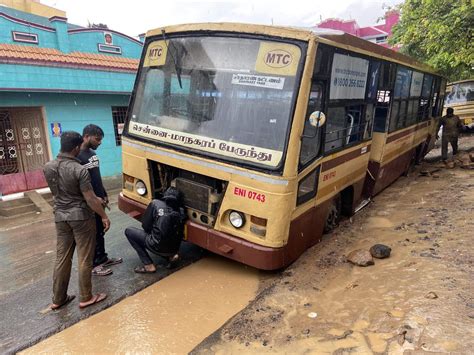 Chennai Rains Mtc Bus Stuck For Over Four Hours In Ditch In Submerged Road