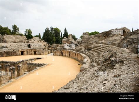 The Ruins Of The Roman Amphitheatre At Italica An Ancient City In