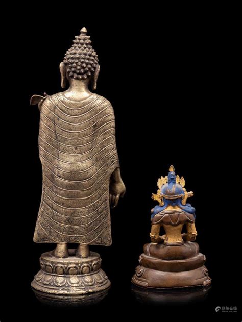 Bidlive A Sino Tibetan Gilt Bronze Figure Of Buddha And A Bronze