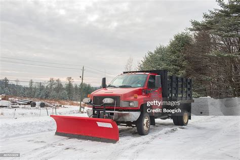 Snow Plow Truck In Winter High-Res Stock Photo - Getty Images