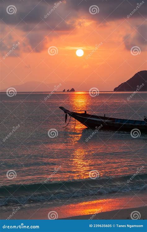 Tropical Beach And A Wooden Fishing Boat At Sunset Stock Image Image