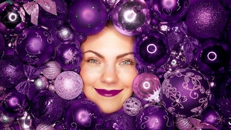 Happy Woman Face Lights Up With Joy In Violet Christmas Tree Toys Balls