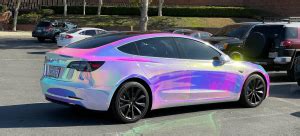 Tesla Model 3 Shows Off Cool Rainbow, Holographic Wrap - TeslaNorth.com